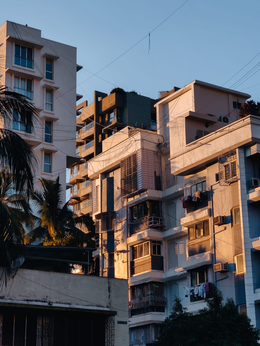 Apartment blocks in Mumbai catching the last of the evening sun.