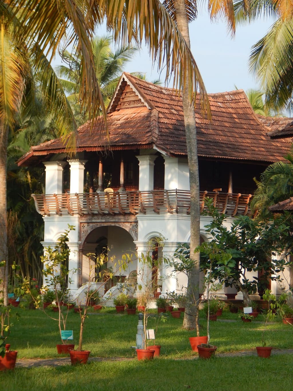 A villa set back behind green meadow, the kind of place people move to once.